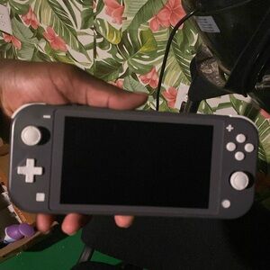 Old handheld switch with Pokémon violet